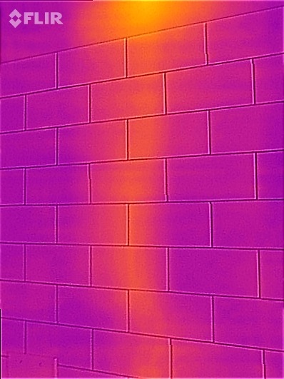 Thermal image of water pipes in the walls of the bathroom.